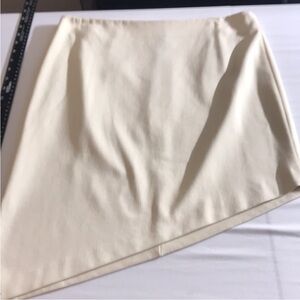 Cache size 12 cream colored mini skirt asymmetrical with slit